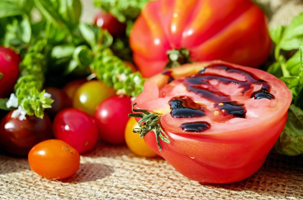 Healthy food with tomato in focus